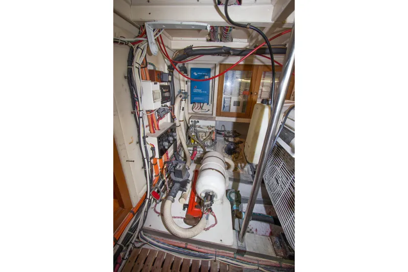 Redhawk Yacht Photos Pics Engine room of 1996 Grand Banks 46 Classic yacht, showcasing electrical systems and equipment.