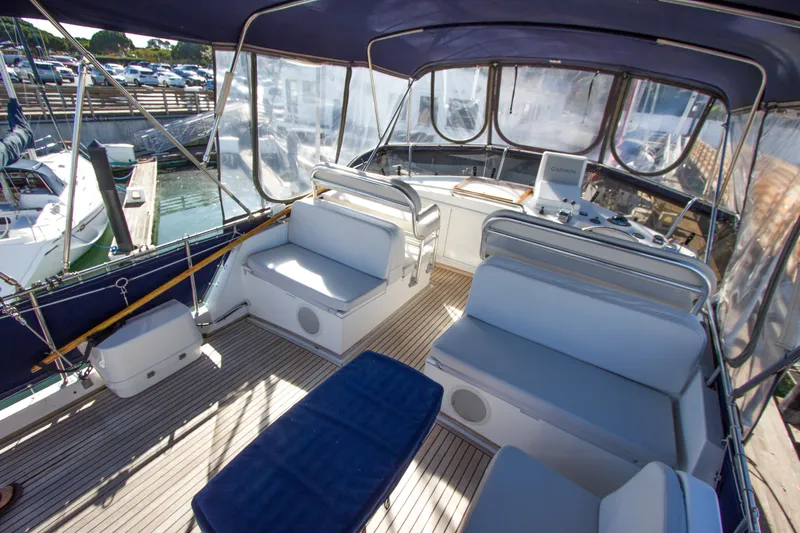 Redhawk Yacht Photos Pics Spacious deck of 1996 Grand Banks 46 Classic yacht with seating and helm.