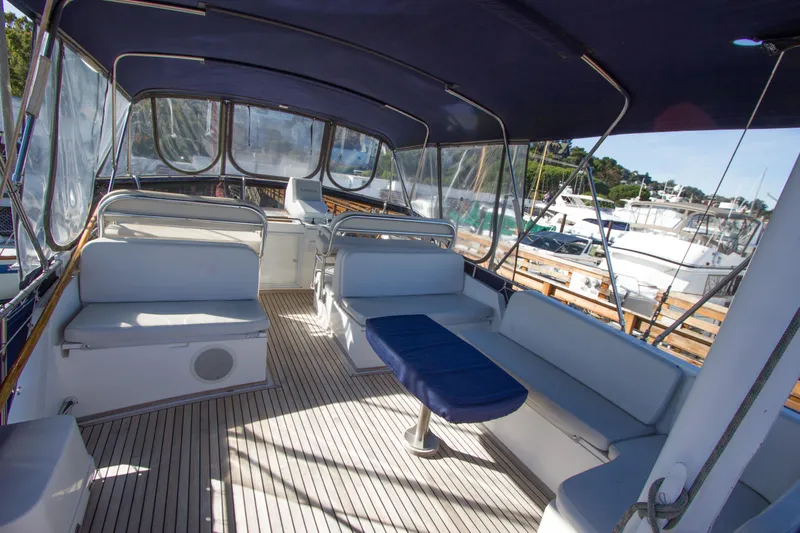 Redhawk Yacht Photos Pics Spacious deck of 1996 Grand Banks 46 Classic yacht with seating and canopy.