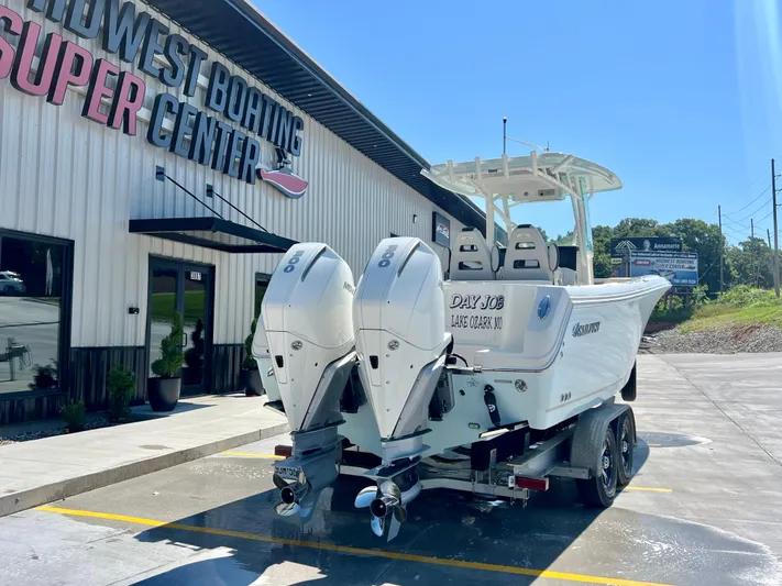  Yacht Photos Pics 2023 Sailfish 290 CC boat at Midwest Boating Center, featuring dual outboard motors.