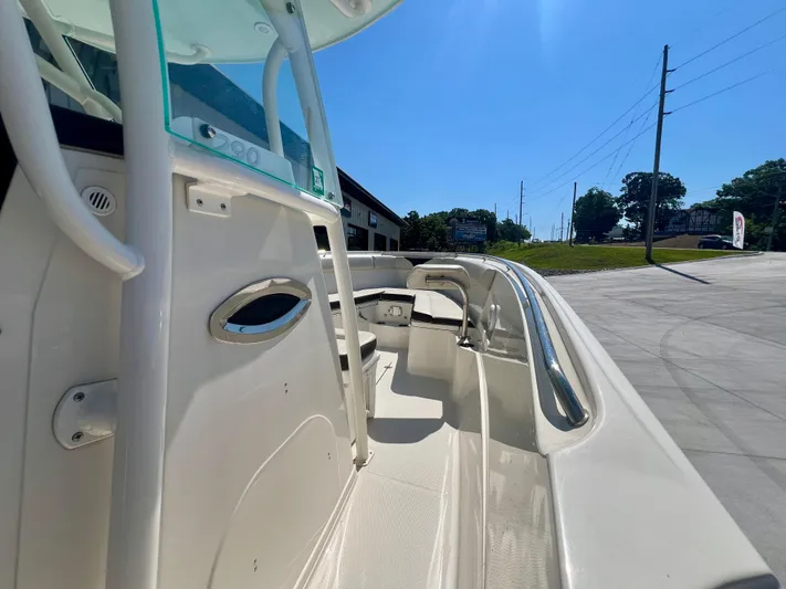  Yacht Photos Pics 2023 Sailfish 290 CC boat interior with sleek design and modern features.