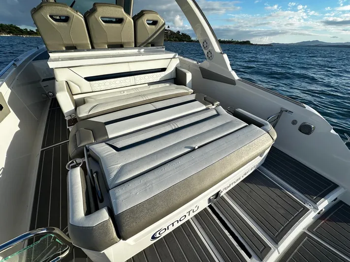  Yacht Photos Pics 2023 Tiara Yachts 34 LS boat interior with luxurious seating on open water.