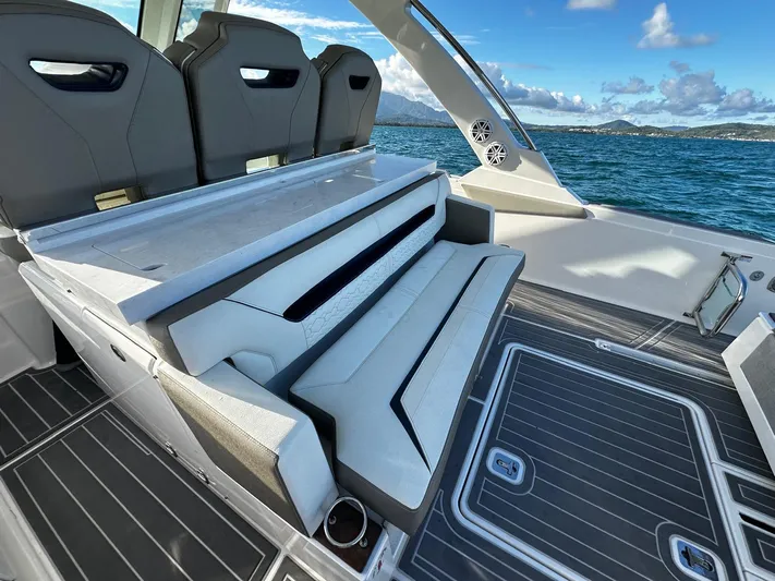  Yacht Photos Pics 2023 Tiara Yachts 34 LS interior with seating, ocean view, and modern design.