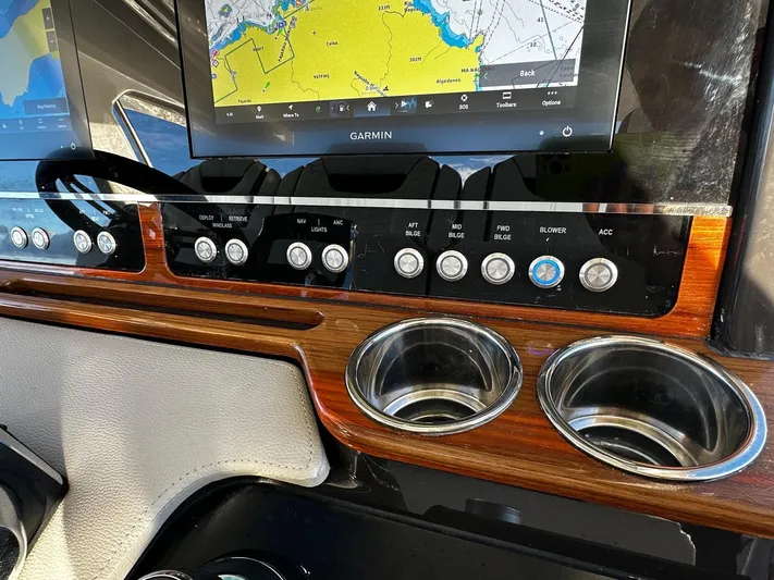  Yacht Photos Pics Dashboard of 2023 Tiara Yachts 34 LS with Garmin navigation and control panel.