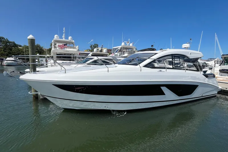  Yacht Photos Pics 2026 Beneteau Gran Turismo 41 yacht docked in marina under clear blue sky.