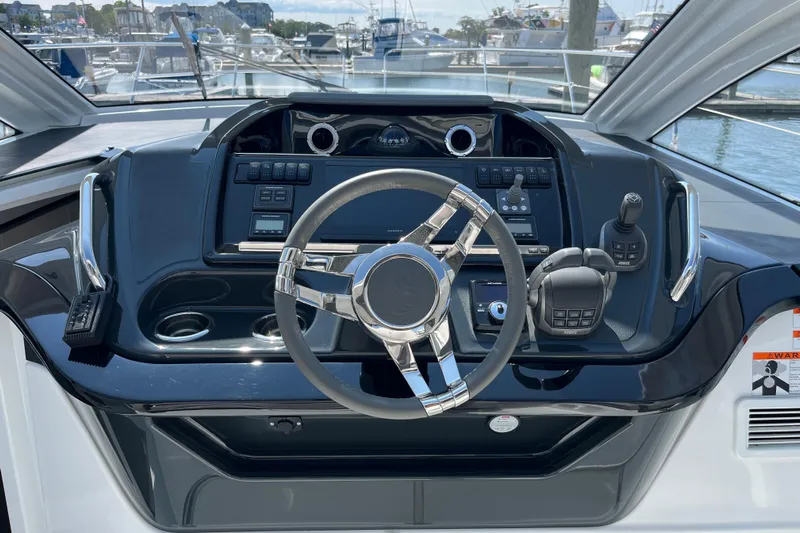  Yacht Photos Pics Helm of 2026 Beneteau Gran Turismo 41 yacht with modern controls and steering wheel.