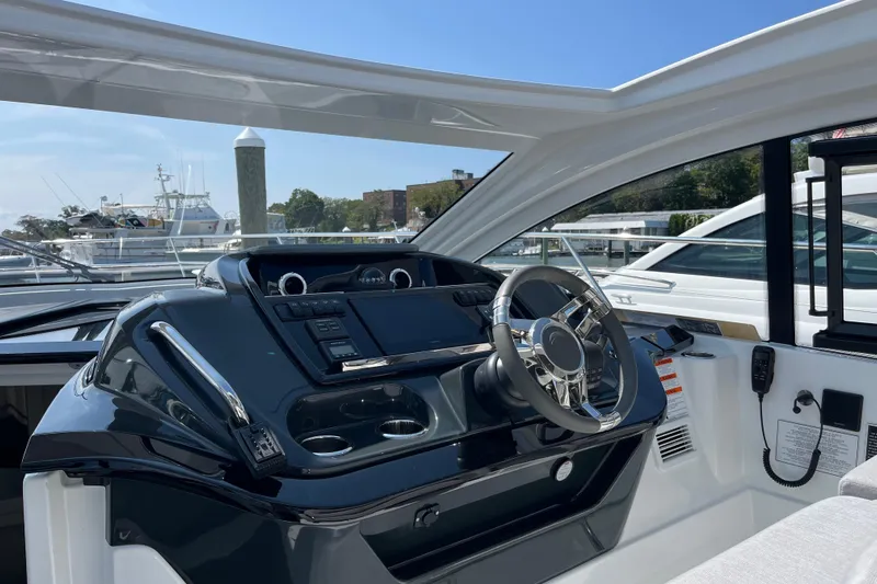  Yacht Photos Pics 2026 Beneteau Gran Turismo 41 yacht helm with modern controls and sleek design.