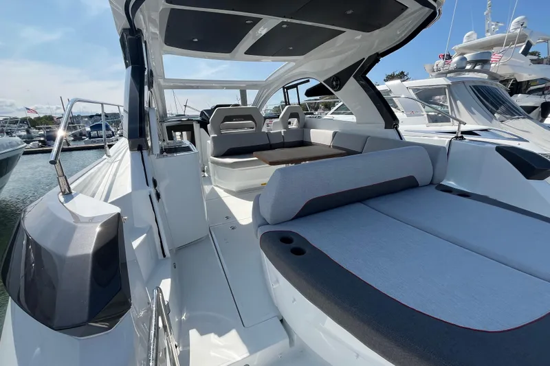  Yacht Photos Pics 2026 Beneteau Gran Turismo 41 yacht interior with sleek seating and modern design.