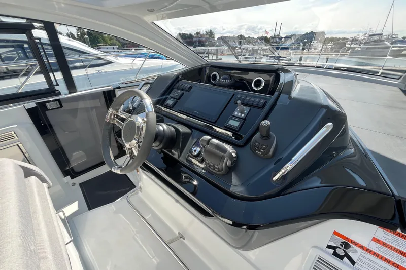  Yacht Photos Pics 2026 Beneteau Gran Turismo 41 yacht helm with modern controls and sleek design.
