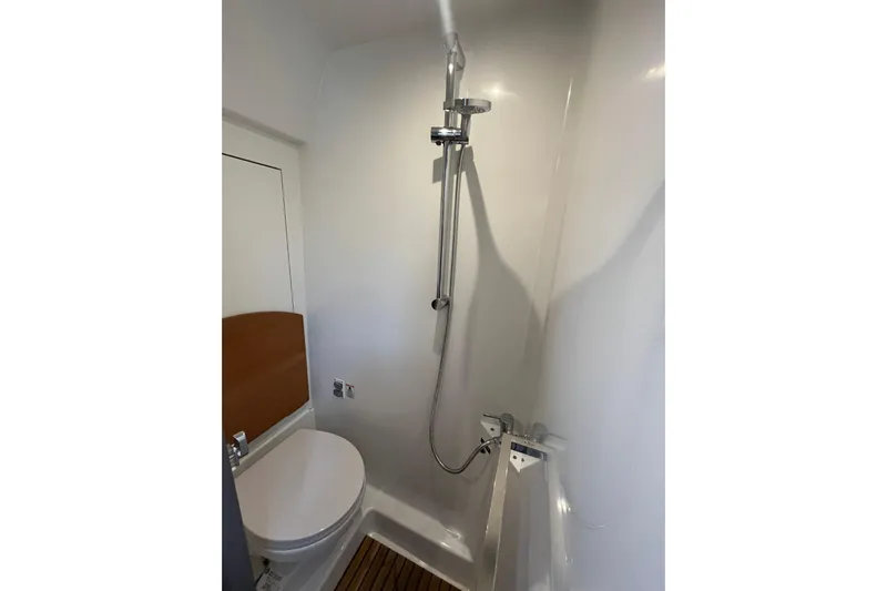  Yacht Photos Pics 2026 Beneteau Gran Turismo 41 yacht bathroom with shower and toilet.