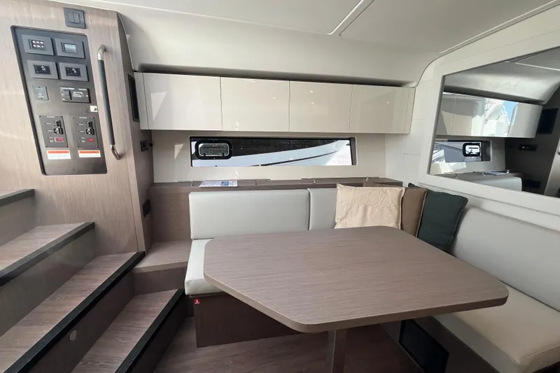  Yacht Photos Pics Interior of 2026 Beneteau Gran Turismo 41 yacht with modern seating and cabinetry.
