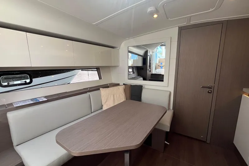  Yacht Photos Pics Interior of 2026 Beneteau Gran Turismo 41 yacht, featuring modern dining area and sleek design.