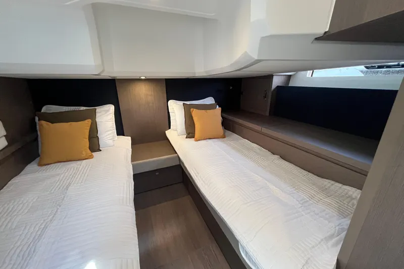  Yacht Photos Pics 2026 Beneteau Gran Turismo 41 cabin with twin beds and modern decor.