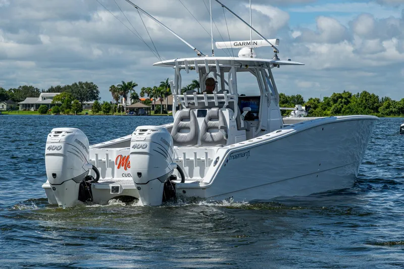  Yacht Photos Pics 2022 Freeman 34VH boat with twin Mercury 400 engines on a sunny day.