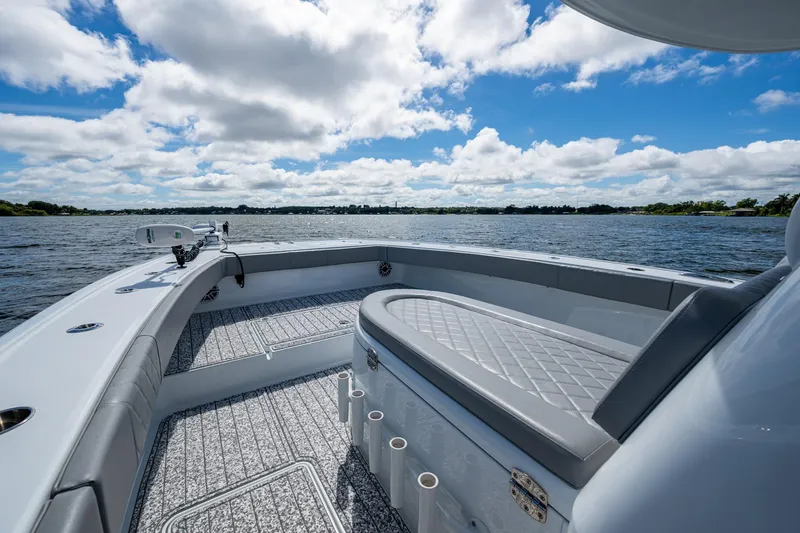  Yacht Photos Pics 2022 Freeman 34VH boat interior with seating, on a sunny day at sea.