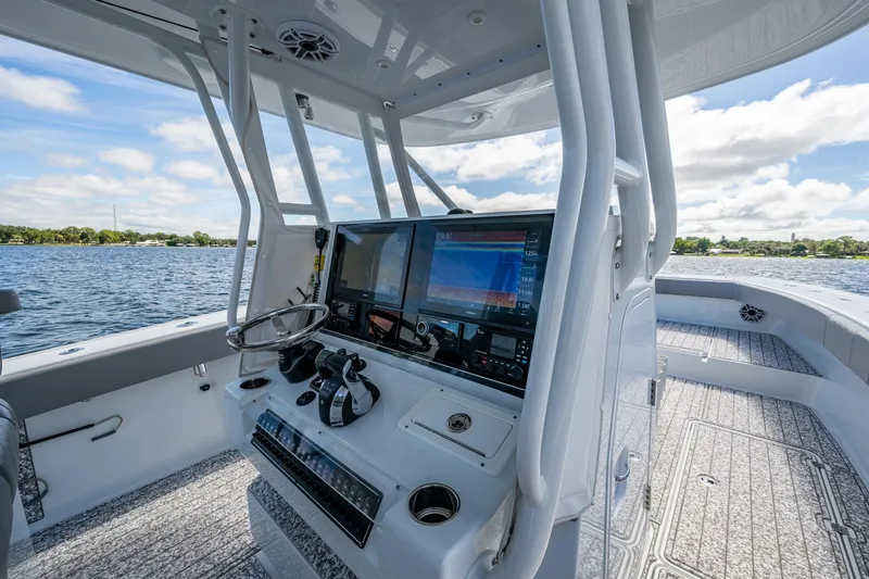  Yacht Photos Pics Interior view of 2022 Freeman 34VH boat cockpit with advanced navigation system.
