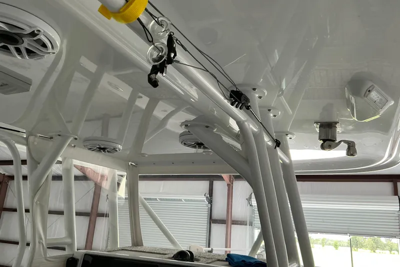  Yacht Photos Pics Interior view of a 2022 Freeman 34VH boat, showcasing speakers and structural details.