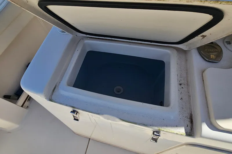  Yacht Photos Pics Open storage compartment on 2022 Grady-White Canyon 306 boat.