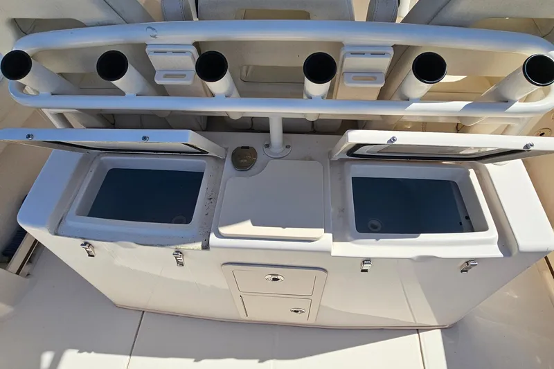  Yacht Photos Pics 2022 Grady-White Canyon 306 boat with rod holders and storage compartments.