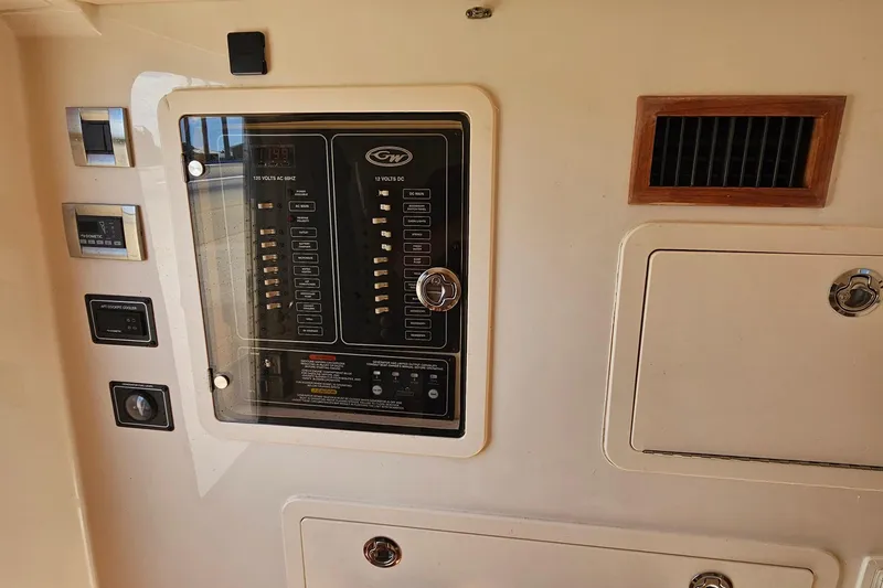  Yacht Photos Pics Control panel of 2022 Grady-White Canyon 306 boat, featuring switches and gauges.