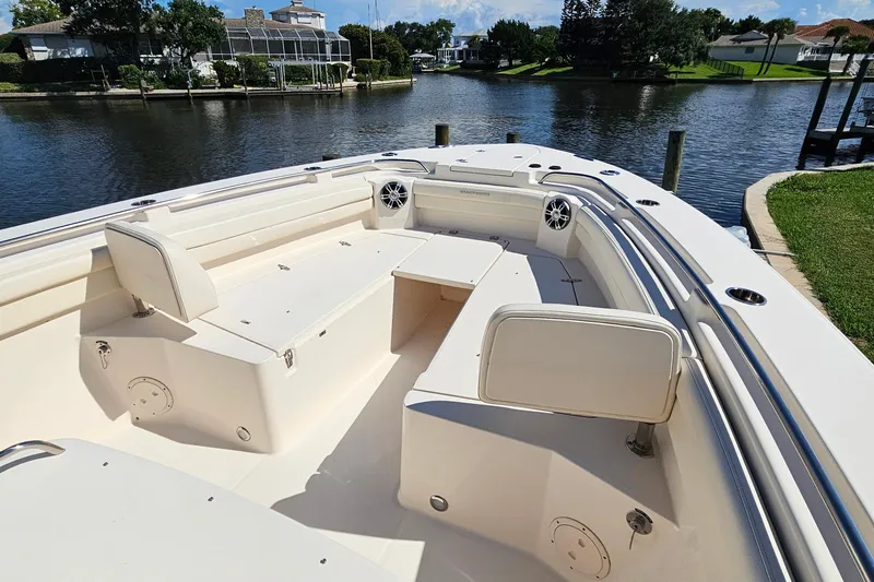  Yacht Photos Pics 2022 Grady-White Canyon 306 boat interior, featuring spacious seating and sleek design.