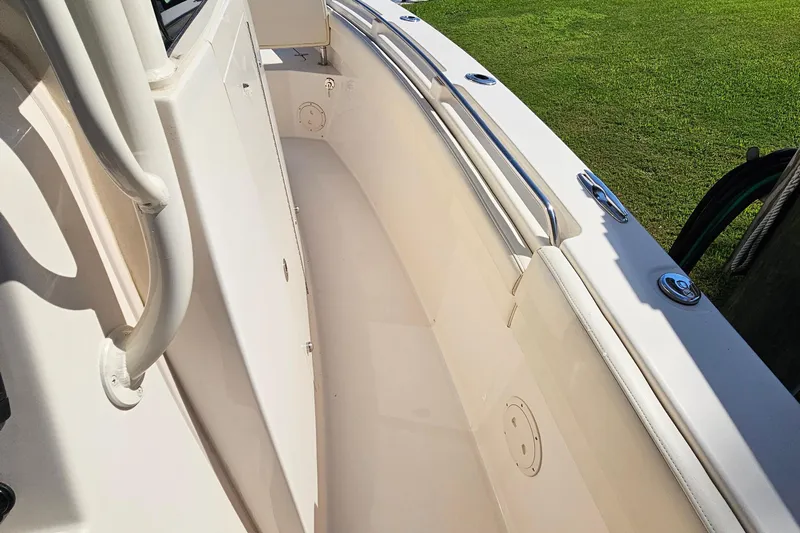  Yacht Photos Pics 2022 Grady-White Canyon 306 boat deck with stainless steel railings and clean design.