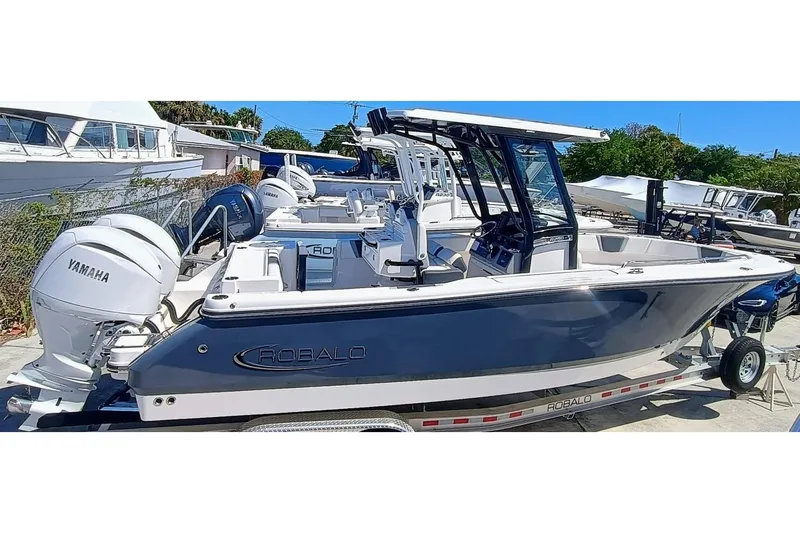  Yacht Photos Pics 2024 Robalo R250 Center Console boat with Yamaha engines on a trailer.