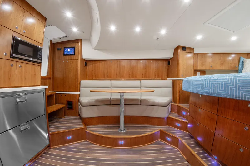  Yacht Photos Pics Luxurious interior of 2025 Albemarle 36 Express yacht with modern amenities and elegant wood finishes.