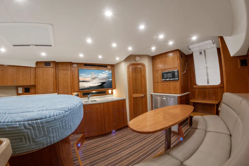  Yacht Photos Pics Luxurious interior of 2025 Albemarle 36 Express yacht with modern amenities and elegant wood finish.