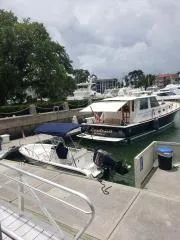 Contessa Yacht Photos Pics 2001 Grand Banks 49 Eastbay SX docked at a marina with nearby boats.