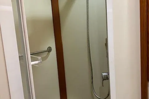 Contessa Yacht Photos Pics Shower area in 2001 Grand Banks 49 Eastbay SX yacht bathroom.