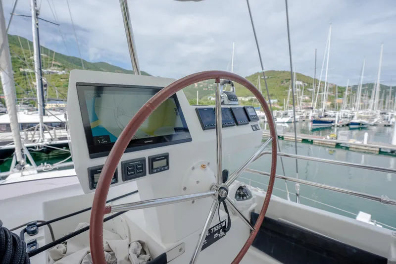  Yacht Photos Pics Steering wheel and navigation system on 2019 Fountaine Pajot Ipanema 58 yacht.