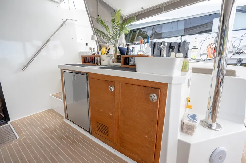  Yacht Photos Pics Luxurious 2019 Fountaine Pajot Ipanema 58 yacht interior with modern kitchenette and elegant design.