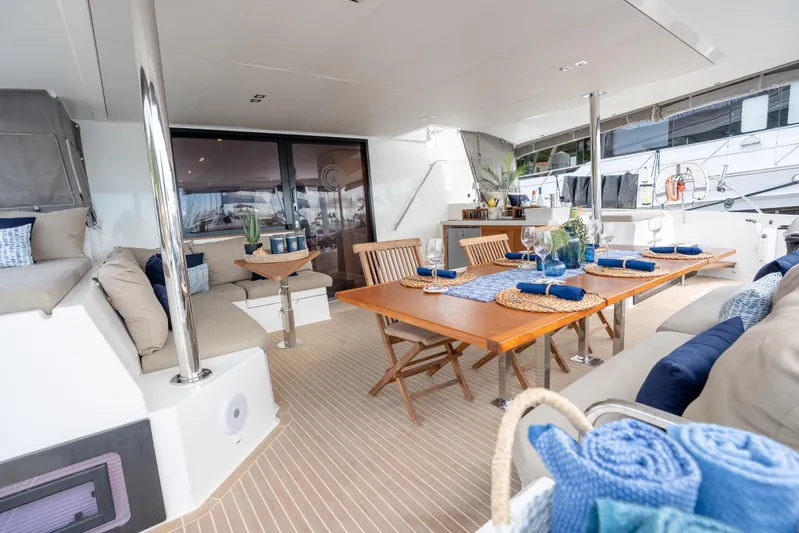  Yacht Photos Pics Luxurious 2019 Fountaine Pajot Ipanema 58 yacht interior with elegant dining setup.