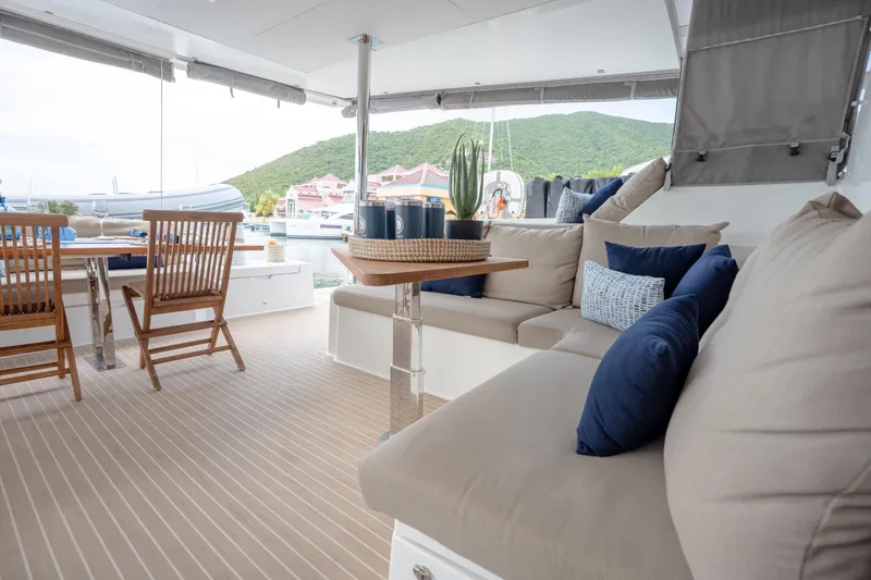  Yacht Photos Pics Luxurious 2019 Fountaine Pajot Ipanema 58 yacht interior with elegant seating and dining area.
