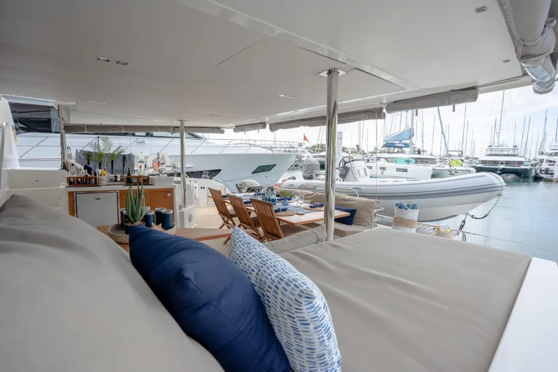 Yacht Photos Pics Luxurious 2019 Fountaine Pajot Ipanema 58 yacht interior with elegant seating and dining area.