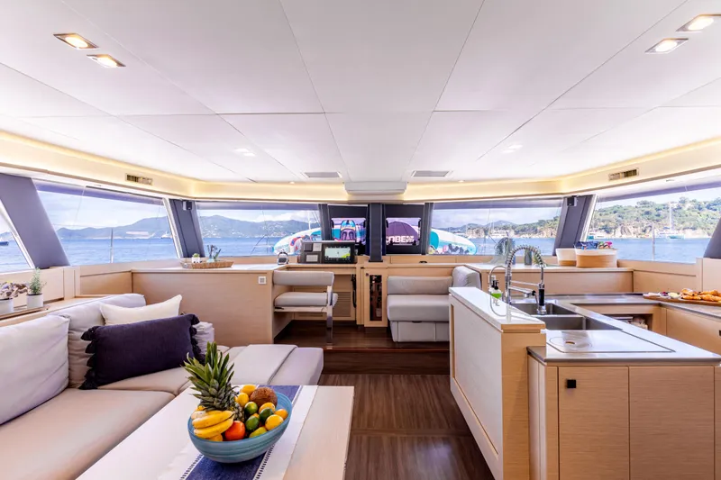  Yacht Photos Pics Luxurious interior of 2019 Fountaine Pajot Ipanema 58 yacht with panoramic ocean views.