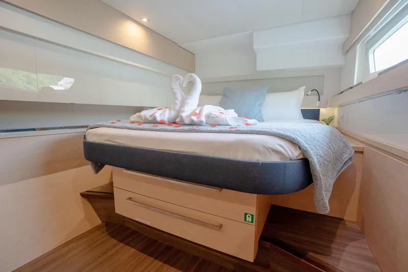  Yacht Photos Pics Luxurious bedroom in 2019 Fountaine Pajot Ipanema 58 yacht with elegant decor.