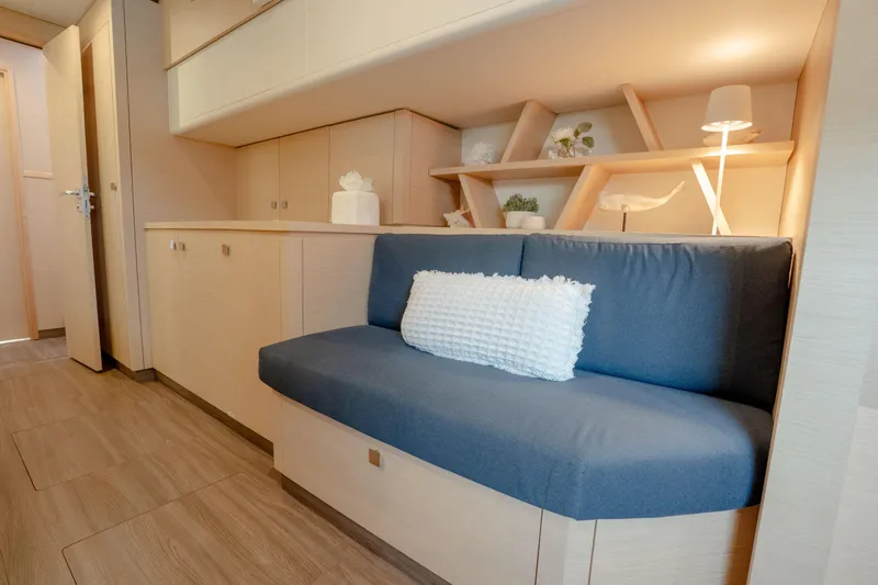  Yacht Photos Pics 2019 Fountaine Pajot Ipanema 58 interior with cozy seating and modern decor.