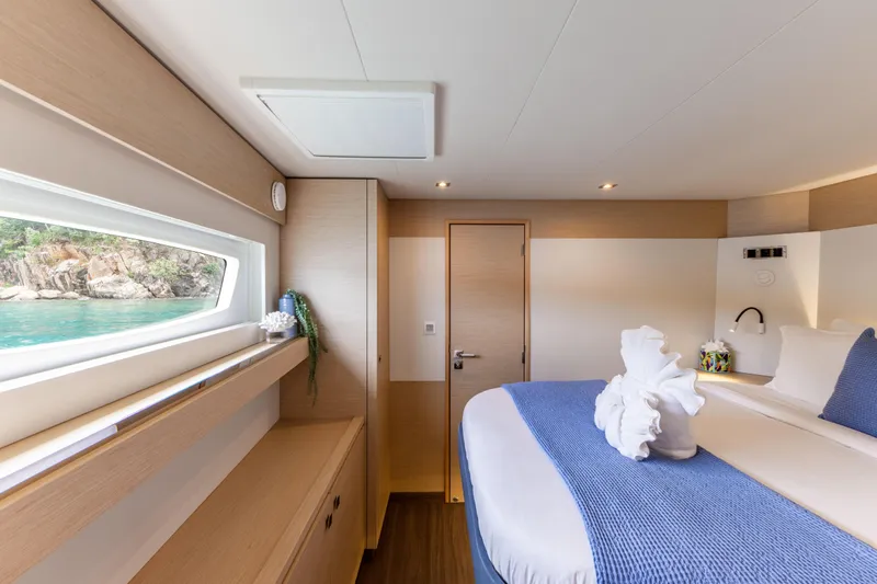  Yacht Photos Pics Luxurious cabin interior of 2019 Fountaine Pajot Ipanema 58 yacht with ocean view.