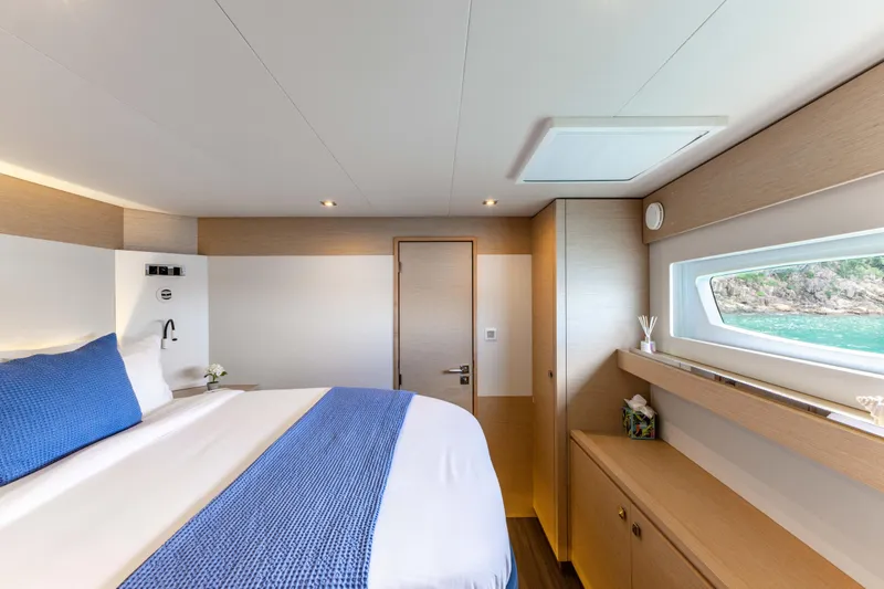  Yacht Photos Pics Luxurious cabin interior of 2019 Fountaine Pajot Ipanema 58 yacht with ocean view.
