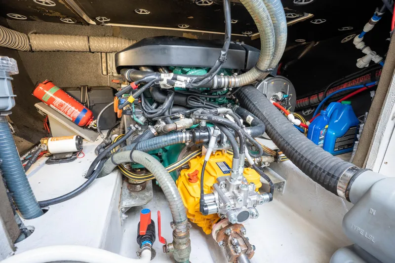  Yacht Photos Pics Engine room of 2019 Fountaine Pajot Ipanema 58 catamaran, showcasing mechanical components.