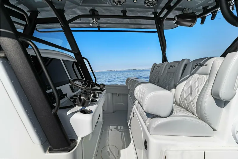 Rumble Fish Yacht Photos Pics 2021 Yellowfin 39 boat interior with luxurious seating and ocean view.