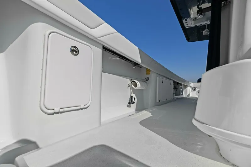 Rumble Fish Yacht Photos Pics 2021 Yellowfin 39 boat interior with storage compartments and sleek design.