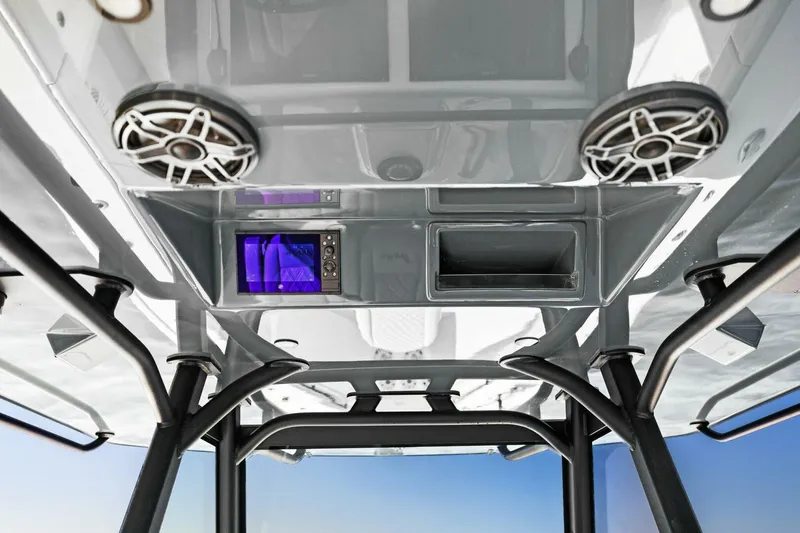 Rumble Fish Yacht Photos Pics 2021 Yellowfin 39 boat interior with speakers and navigation system.