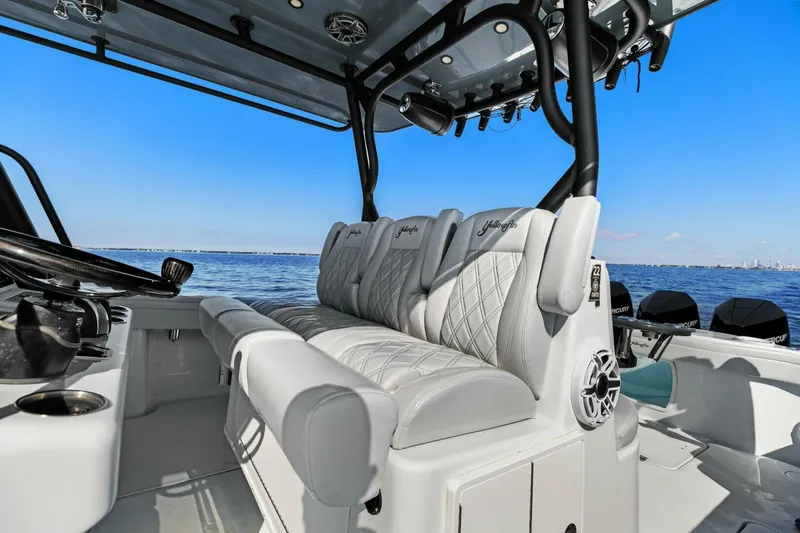 Rumble Fish Yacht Photos Pics 2021 Yellowfin 39 boat interior with luxurious seating, ocean view, and modern design.