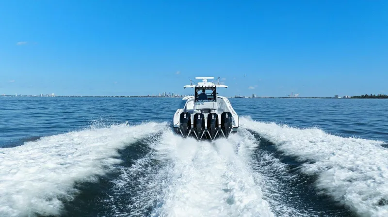 Rumble Fish Yacht Photos Pics 2021 Yellowfin 39 boat cruising on open water with powerful engines.