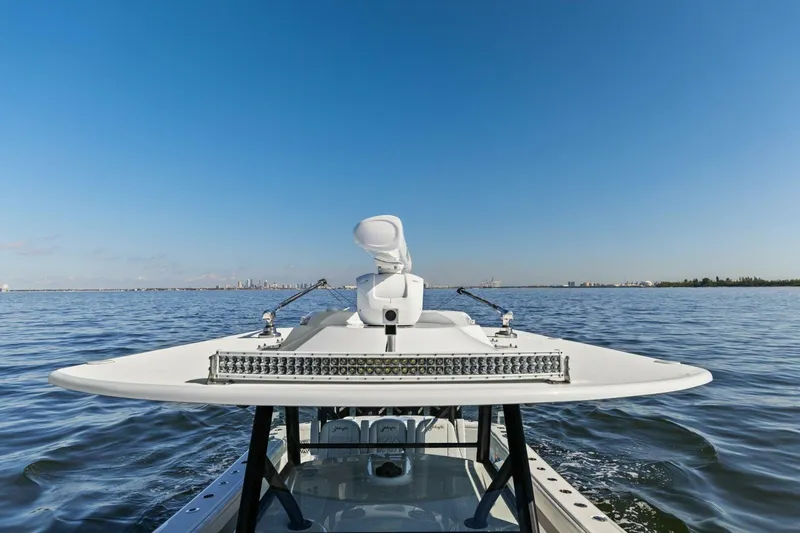 Rumble Fish Yacht Photos Pics 2021 Yellowfin 39 boat on open water under clear blue sky.