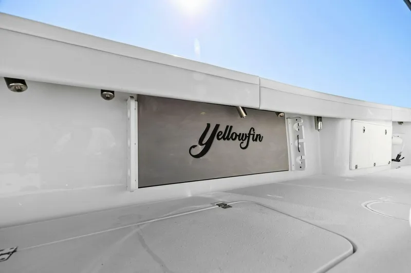 Rumble Fish Yacht Photos Pics 2021 Yellowfin 39 boat interior with logo, showcasing sleek design and craftsmanship.