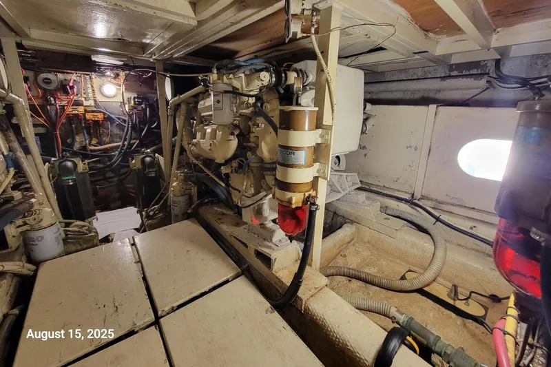 'charisma' Yacht Photos Pics Engine room of 1985 Chris-Craft 500 Constellation yacht, showing machinery and wiring.